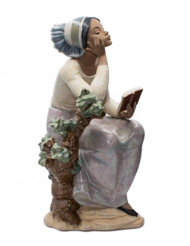 Lladró "Girl reading" statue